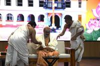 HH Swamiji being honored with a traditional shawl